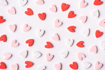 Valentine day concept. Photo image of cute lovely red white and pink color hearts isolated on white background