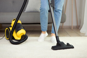 Vacuum cleaner yellow in the interior of the room