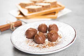 Chocolate ball cake with cocoa powder