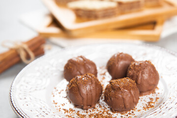 Chocolate ball cake with cocoa powder