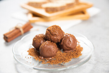 Chocolate ball cake with cocoa powder