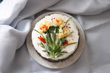 Сake with cream, cheese and vegetables