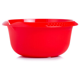 Red plastic bowl on white background isolation