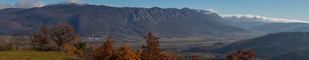 Vipava valley as seen from Erzelj, looking down towards Vipava and magnificent ridge of Nanos mountain.