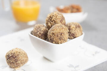 Cake balls with almonds, biscuits and orange juice