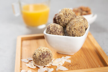 Cake balls with almonds, biscuits and orange juice