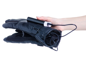 Heated Gloves with power bank in hand on white background isolation