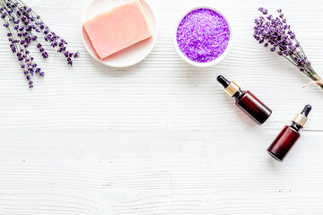 Obraz na płótnie Canvas Lavender cosmetics spa set. Natural spa essential oil and sea salt