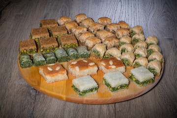 A delicious mix of baklava on wood 
