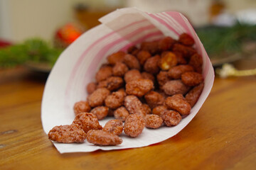 Roasted almonds in christmassy dekoration