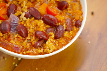 Chili con carne in a white bowl