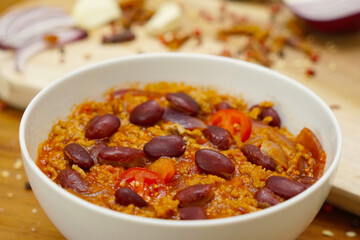 Chili con carne in a white bowl