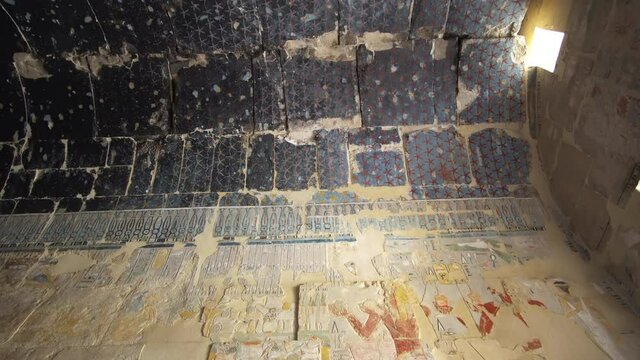Mortuary Temple of Hatshepsut chamber interior with night sky stars painting wiht hieroglyphic relief