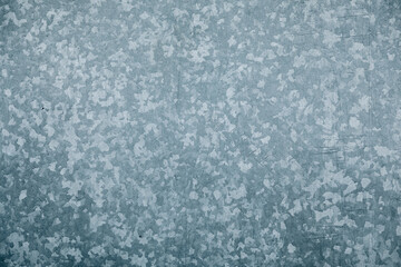 old galvanized steel background. Close-up of a gray zinc plate.