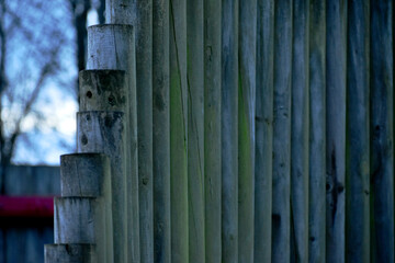 Perspective of an old designer log fence, England