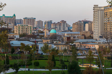 Fototapeta premium Baku, Azerbaijan - December 04, 2020:Sunset in one of the parks in Baku