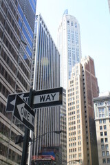 Fototapeta na wymiar one way street signs in two directions in new york 