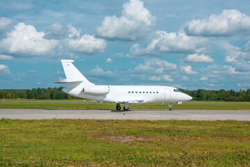 White reactive private jet, taxi to take off.