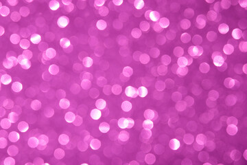 Abstract pink magenta color dot defocused bokeh background. Holiday festive concept. Winter. 