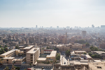 Aerial view of Cairo of crowded buildings with dust sky from Saladin Citadel of Cairo