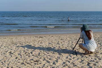 photographer on the beach