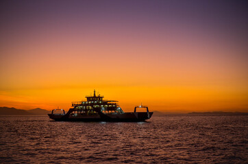 Ferry with sunset background in Puntarenas CosTa Rica.