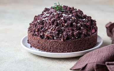 Homemade chocolate cake with cherry and whipped cream. Cake Mink mole or Mole hole cake.