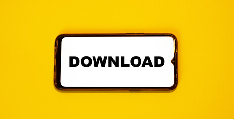 Text on the smartphone screen DOWNLOAD. Technology on an orange background.
