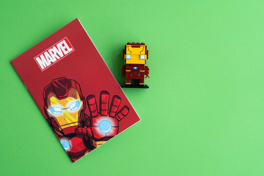 Minsk, Belarus. December, 2020. Popular Super Heroes Marvel. Iron Man. Notebooks, copybook, pen, Lego constructor. Education and school background.