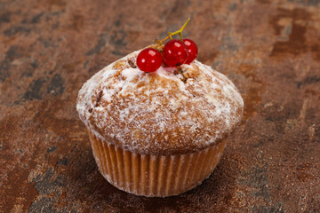 Sweet tasty muffin with red currants