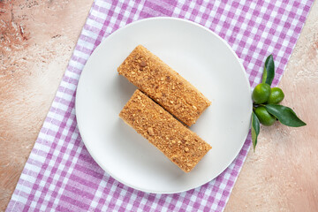 top view yummy cake slices inside plate on light background cake pie biscuit
