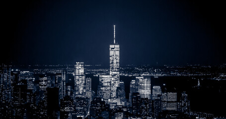 Blue Perspective of Breathtaking Panoramic and Aerial View of Manhattan, New York City at Night. Beautiful, Illuminated, Futuristic Buildings. Freedom Tower, Lady Liberty