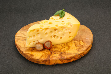 Maasdam cheese - yellow triangle with holes