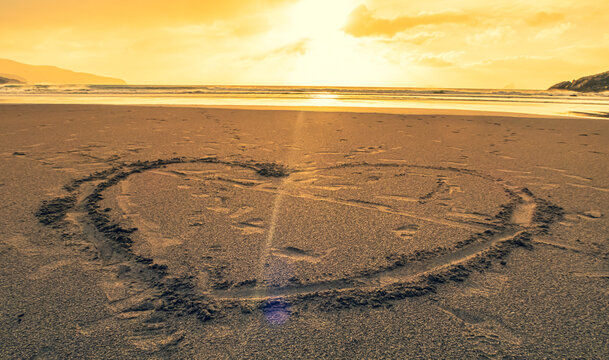 heart- a picture on sand