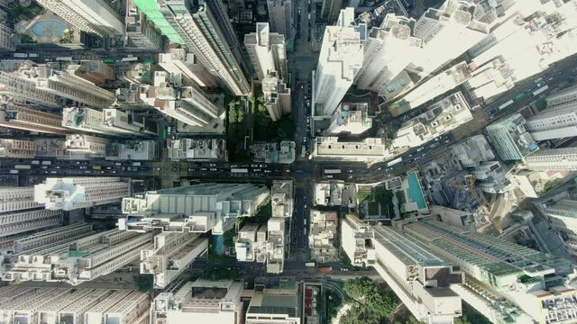 Downtown Hong Kong city skyscrapers and urban traffic, Aerial view.