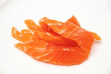 Fresh salmon fillet piece on isolated white background.