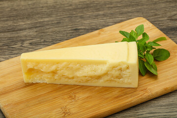 Hard parmesan cheese served basil