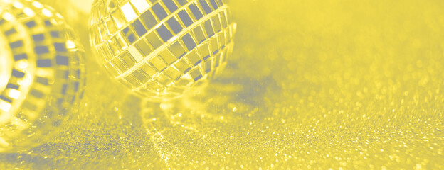 Close-up Crystal ball Decorated on Christmas night on a shiny background. Visualization trendy colors of year 2021 - Gray and Yellow.
