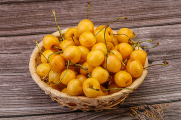 Sweet ripe yellow cherry heap