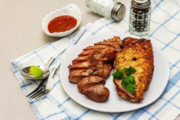 Fried duck breasts with sweet and sour berry sauce