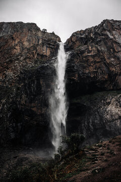 waterfall in the mountains © Zhoomart