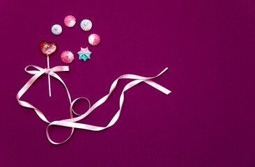 Composition for Valentine's Day. Sweets with heart and ribbons. Copy space