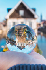 Glass Lens Crystal Photographic Sphere Ball showing magnified and inverted images of Strasbourg