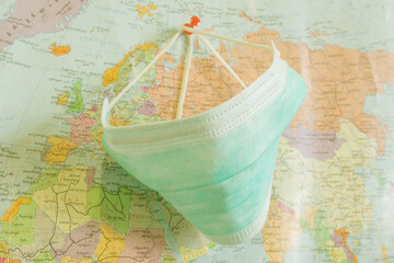 Of medical Concept during Pandemia. Pattern of medical masks on map background