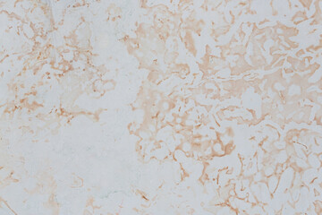 Dolomite texture. Natural rock with beautiful beige patterns on the surface. Polished flat stone. Classic luxury decoration building material. Solid stone background.
