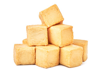 close-up of a pile of diced fish tofu isolated white background with clipping path