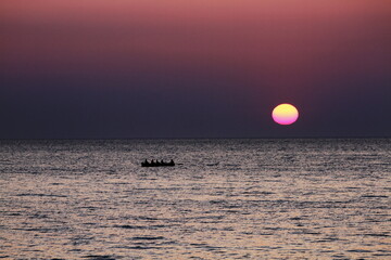 sunset at  livorno beach , Italy