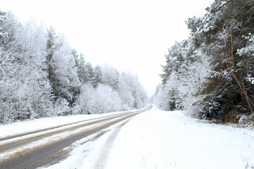 winter forest road, poorly cleared, landscape
