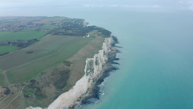 High Aerial dolly forward shot of the White cliffs of dover UK