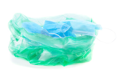 Fototapeta premium Garbage bag with medical masks.